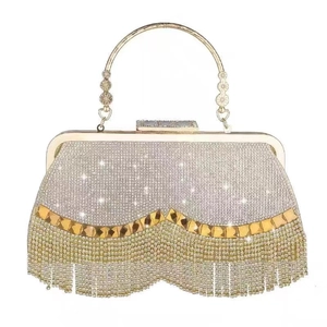 Elegant gold and silver evening clutch with sparkling rhinestone tassels and metal handle