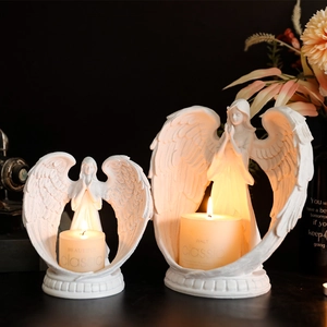 Nordic white angel prayer candle holder set with glowing candles for romantic decor