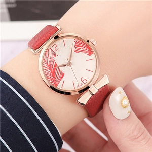 Close-up of Tadi fashion watch with red leaf pattern dial and bow-knot leather strap