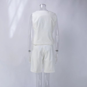 Rear view of white two-piece vest and shorts set in premium woven textured fabric