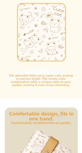 Detail of cute cat illustration and yellow buckle on a beige short zip wallet for women