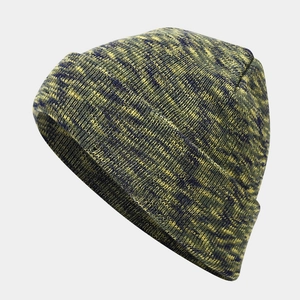 Close-up of thick tie-dye knit beanie with ribbed texture in green and blue