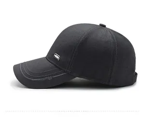 Detail view of dark grey baseball cap featuring sport embroidery and side metal ornament