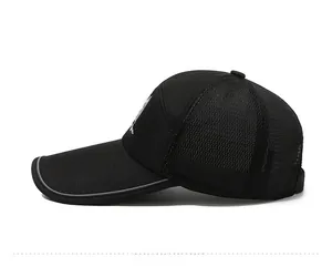 Detail of breathable black mesh baseball cap featuring reflective brim and white logo embroidery