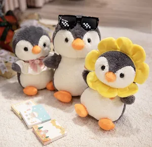 Set of three cute penguin plush toys with sunflower, sunglasses, and bow decorations