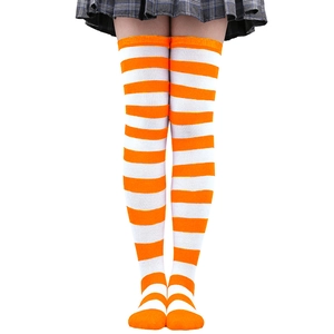 Detailed view of orange and white striped over-knee socks for cosplay and fashion