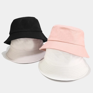 Minimalist cotton bucket hats in four macaron colors featuring reinforced stitched brims