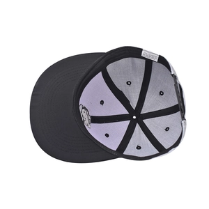 Detail view of hip hop cap interior showing 100% polyester fabric and seam structure