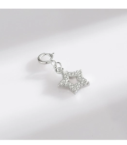 Macro shot of S925 sterling silver star pendant with cubic zirconia and lobster clasp