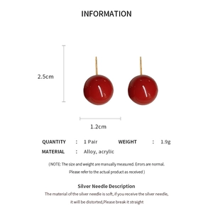 Full technical details and size information for red spherical ball stud earrings