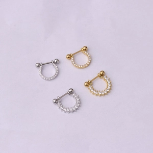 Micro shot of 20G stainless steel U-shaped cartilage studs with cubic zirconia in gold and silver