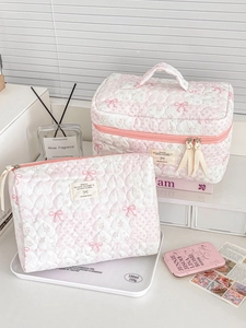 Pink and white quilted floral makeup bag set with cute bow patterns for travel