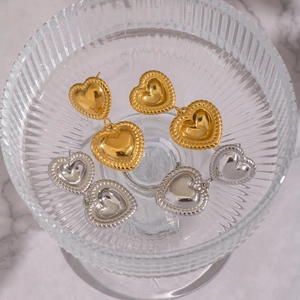 Lace texture heart-shaped earrings in gold and silver stainless steel minimalist design
