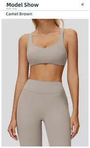 Detail of camel brown cross-back sports bra and yoga pants set in high-stretch matte fabric