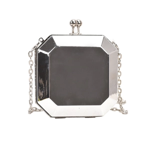 Silver octagonal acrylic evening clutch bag with metallic finish and chain strap