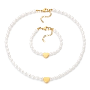 Elegant pearl jewelry set with golden heart pendant necklace and bracelet set