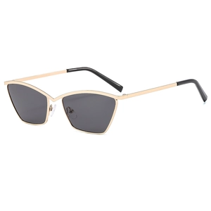 Fashionable cat-eye metal sunglasses with gold frame and grey lenses in 45-degree view