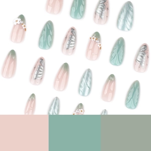 3D floral press-on nails in sage green and pink almond shape with butterfly patterns