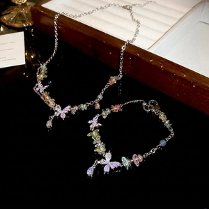 Colorful crushed stone necklace and bracelet set with glittery purple butterfly pendants