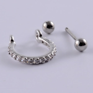 Detailed view of silver surgical steel cartilage studs with micro-set cubic zirconia stones