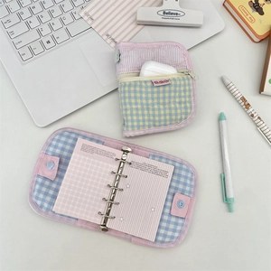 Quilted fabric binder notebook featuring blue plaid pattern and zipper storage pocket