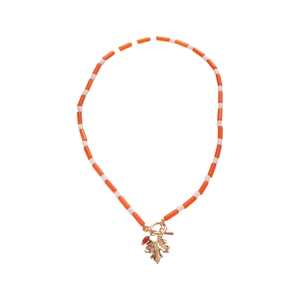 Beaded maple leaf pendant necklace with orange accents and golden OT buckle hardware