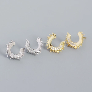 Elegant gold and silver C-shaped zircon stud earrings shown on a neutral background