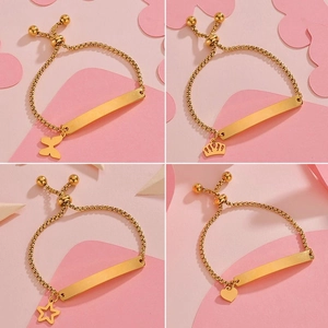 Adjustable gold plated box chain bracelets with engraved ID bars and assorted charms