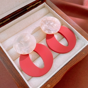 Retro geometric acrylic earrings featuring white pearl studs and red matte oval hoops
