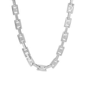 Close-up of silver necklace with brushed texture rectangular geometric chain links