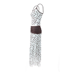 Detail of polka dot crop top and maxi skirt with contrast pleated waistband detail