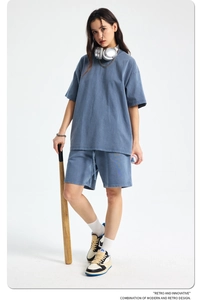 Detail of blue washed cotton vintage sportswear set with heavy fabric texture