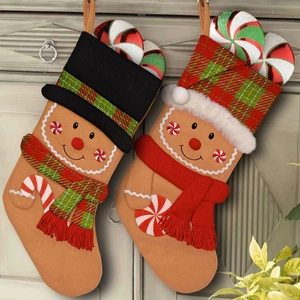Gingerbread man Christmas stockings set with red and green plaid for holiday decoration