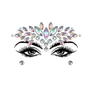 Detailed view of luminous iridescent crystal face jewels arranged in a skull pattern
