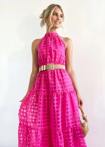 Detail of rose red plaid halter dress featuring a light brown square buckle leather belt