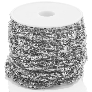 Silver bead chain roll for jewelry making on white plastic spool for DIY necklace design
