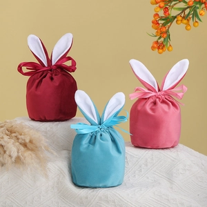 Velvet Easter bunny ear gift bags in wine red, blue, and pink with ribbon bows