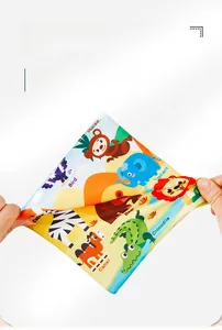 Close-up of durable tear-resistant baby tissue toy with colorful cartoon animal patterns