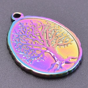 Detailed macro view of the colorful rainbow tree of life pendant in oval stainless steel