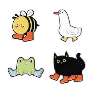 Cute metal enamel pins set featuring cartoon animals with colorful boots on white background