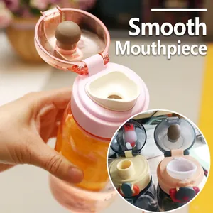 Transparent orange portable sports plastic water bottle with smooth rim and carry strap