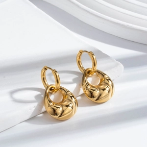 French vintage gold croissant earrings in teardrop shape with spiral texture for women