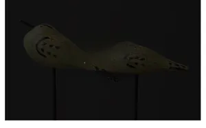 Detail view of yellow crackle glaze bird statues with artistic black spotted texture
