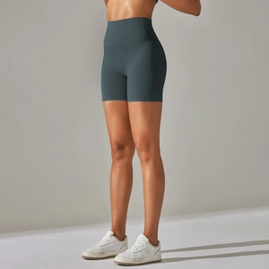 Detailed side view of high-waisted dark grey yoga shorts with seamless high elasticity finish