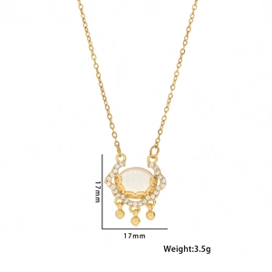 Golden Ruyi lock necklace with white chalcedony, tassel pendant, and diamond accents