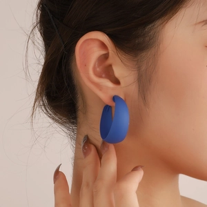 Minimalist blue matte C-shaped hoop earrings for women in a stylish bamboo texture design