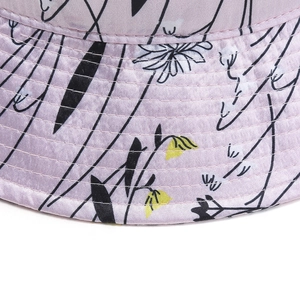 Lavender satin bucket hat with floral patterns and reinforced brim stitching for sun protection
