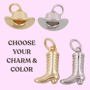 Close-up of vintage cowboy hat and boot charms in 18k gold and silver plated metal