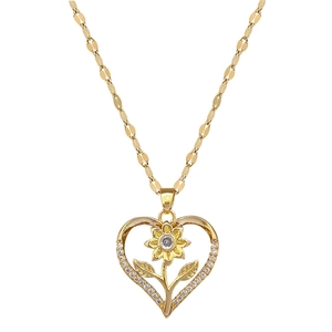 Elegant gold titanium heart necklace with sunflower design and sparkling crystals