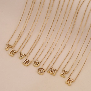 Gold letter pendant necklace with sparkling crystals and fine chain for women